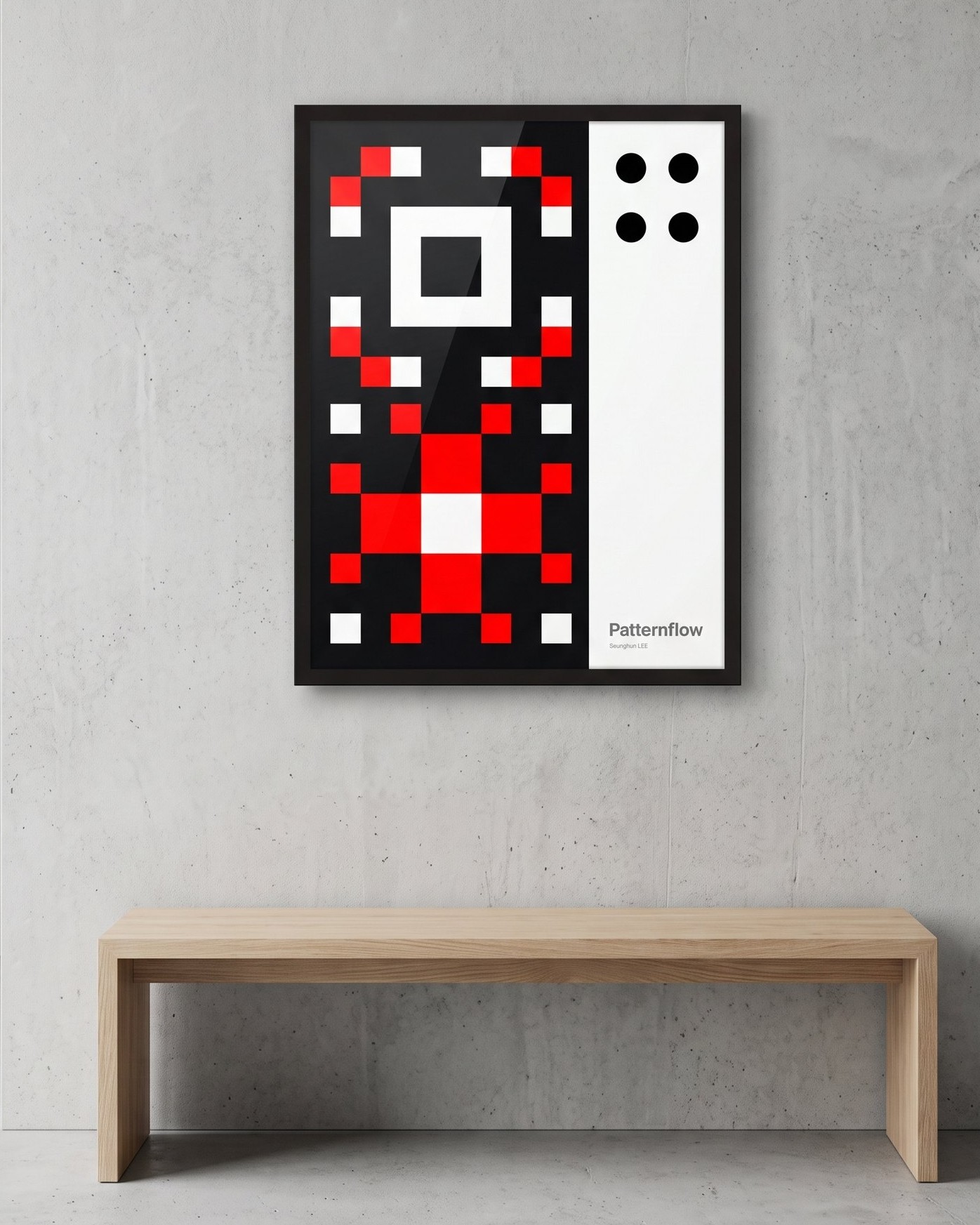 Origin Grid, in a black frame, on a concrete wall above a wooden bench