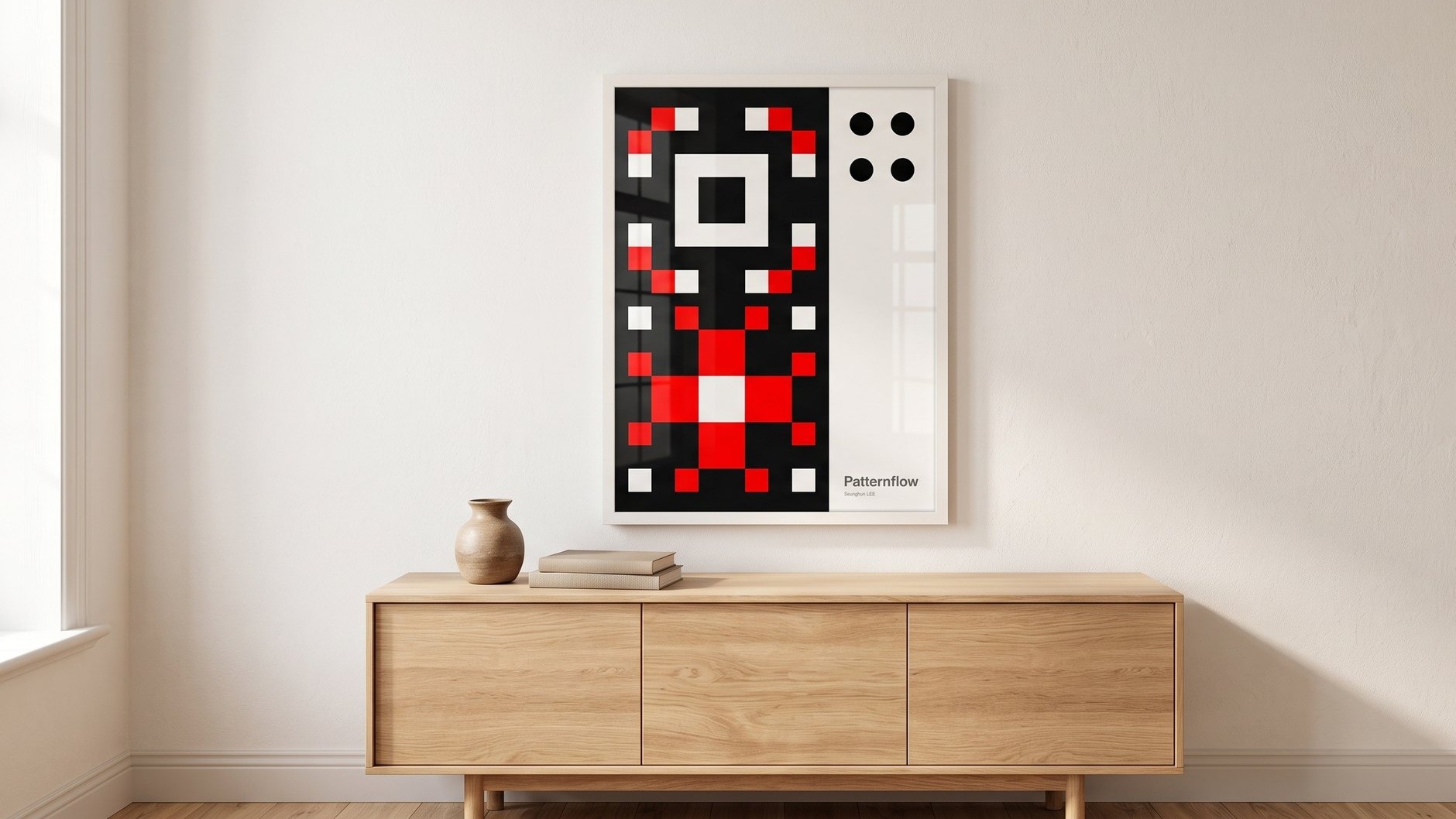 The Origin Grid poster in a white frame on a light wall, above a wooden sideboard with a vase and two books